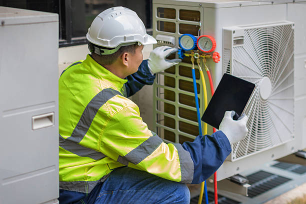 Professional Air Duct Cleaning technician working in Fitchburg, WI